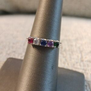 Silvertone ring with crystal  stones AC trademark size 7